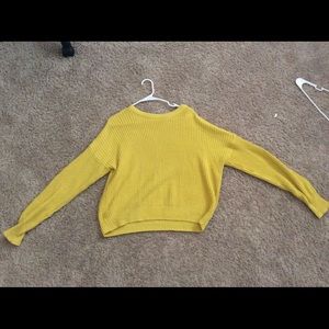 yellow sweater